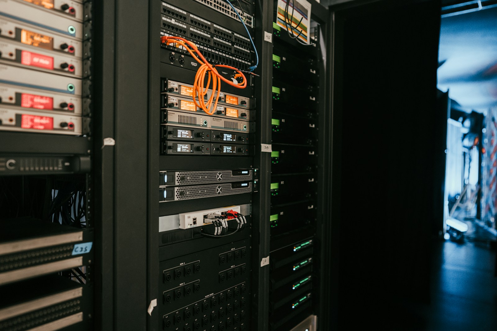 Rows of servers in a data center aisle